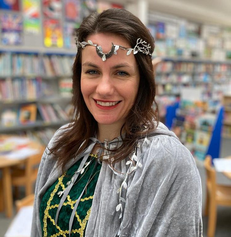 staff wearing world book day costume