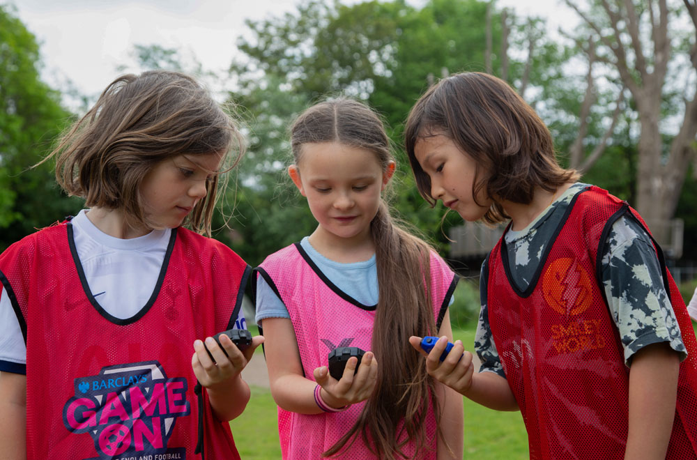 pupils in pe bibs