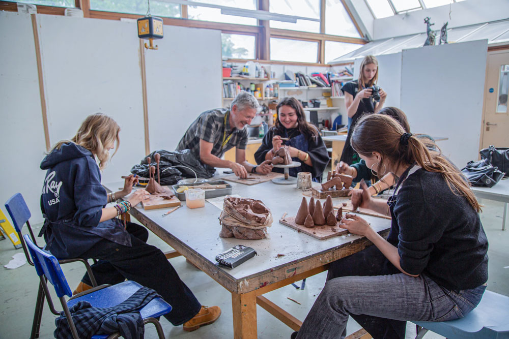 students in a sculpting class