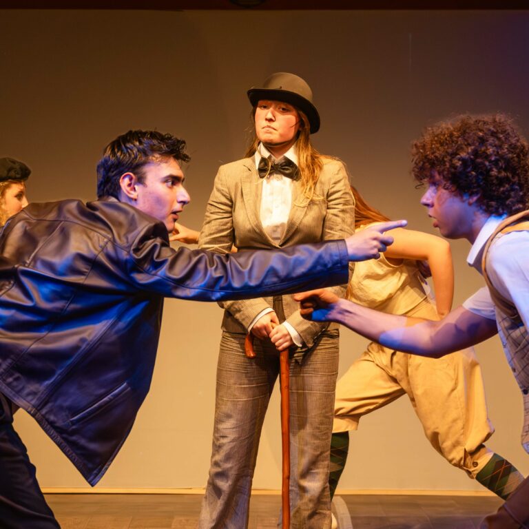 Students who are part of the UAL Level 3 Extended Diploma in Performance and Production Arts on stage performing A Midsummer Night's Dream