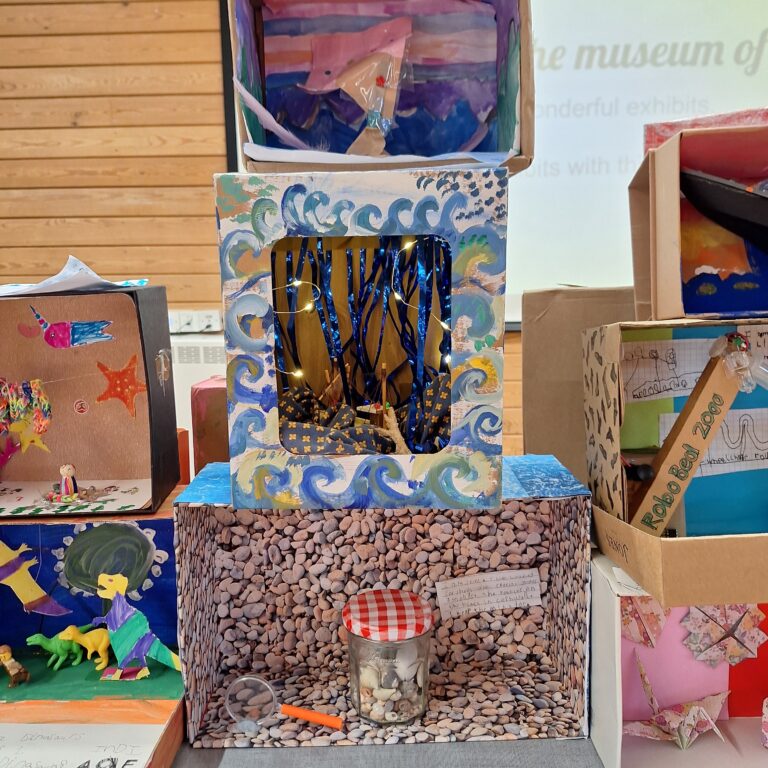Close-up of a selection of decorated shoeboxes.