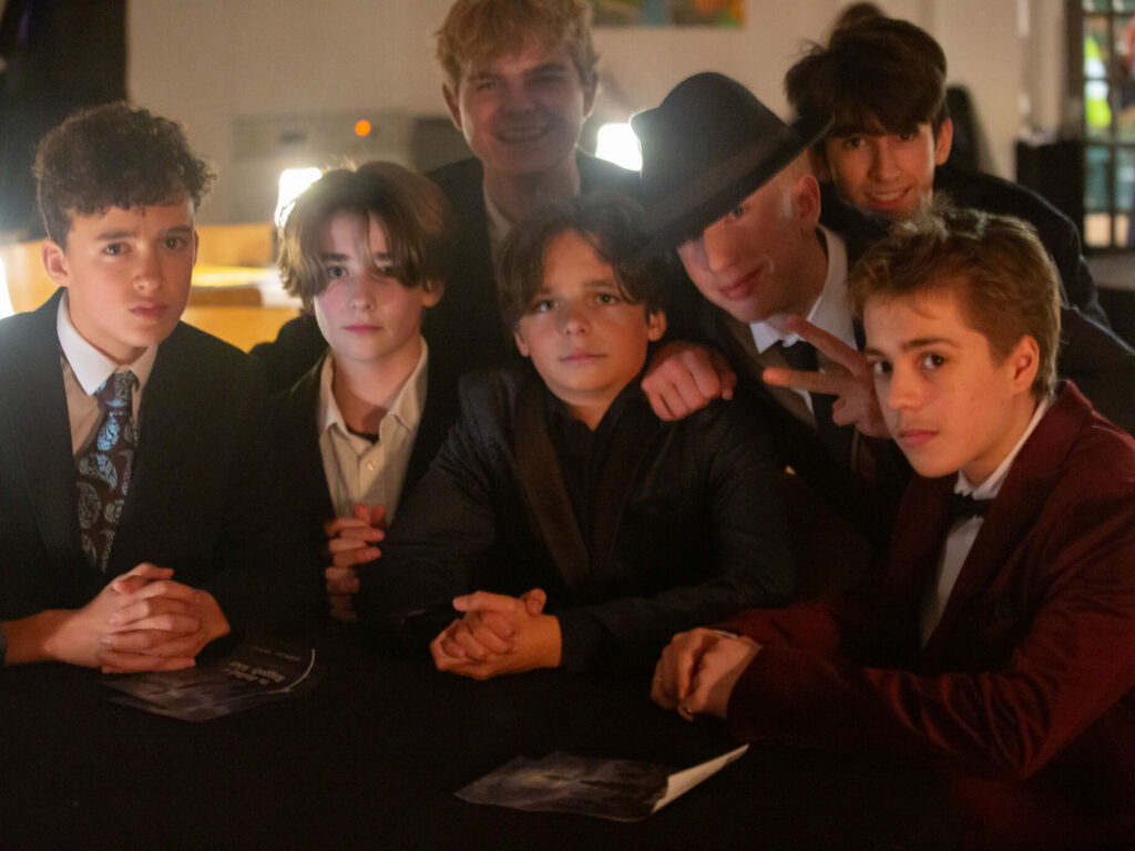 a group of students wearing suits ready to perform as part of the Jazz evening