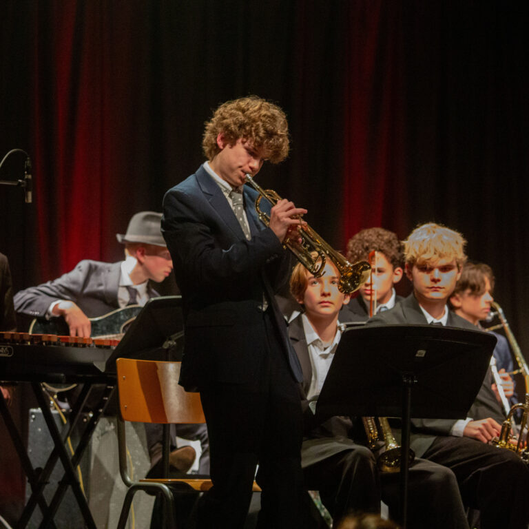A student performs a trumpet solo at the jazz evening
