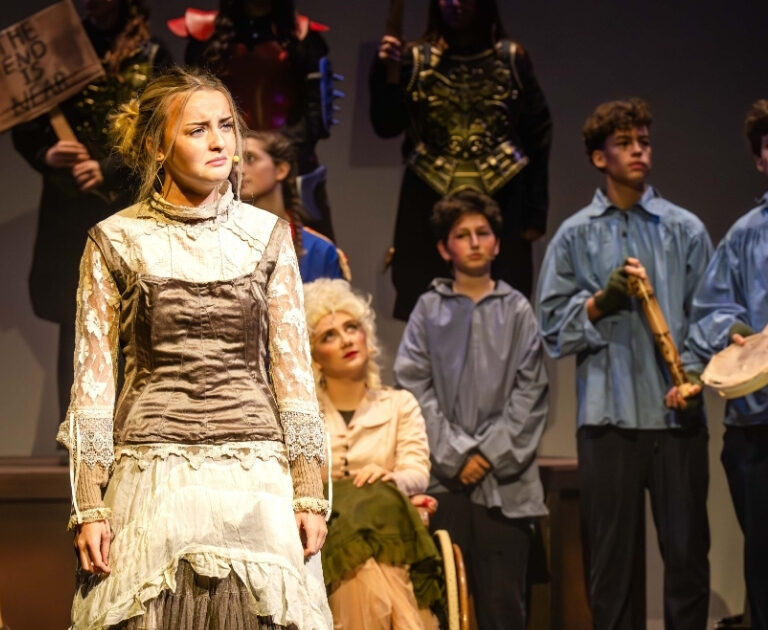 Performers on stage during The Ballad of Raggedy Alice