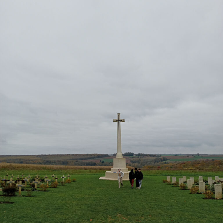 Students from The King Alfred School walk through Tyne Cot Cemetery in Belgium