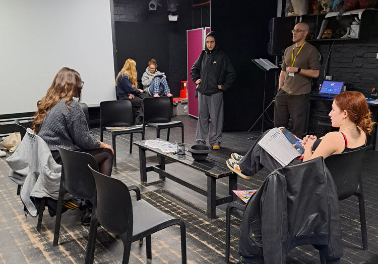 A teacher directs a rehearsal of a play at The King Alfred School North London