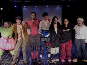 A group of Year 12 students take a bow after a performance at The King Alfred School