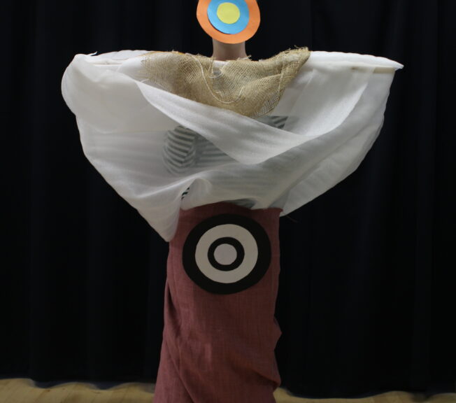 A student wears an abstract fashion design