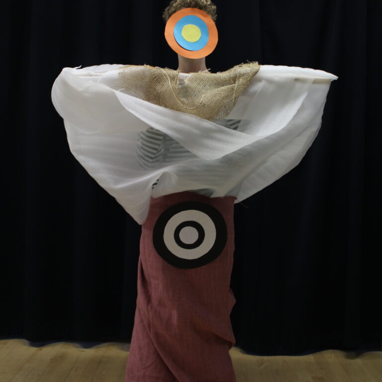 A student wears an abstract fashion design