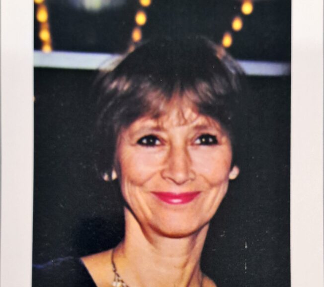 Archive photograph of a smiling Kara Conti, showing her in the 1980s