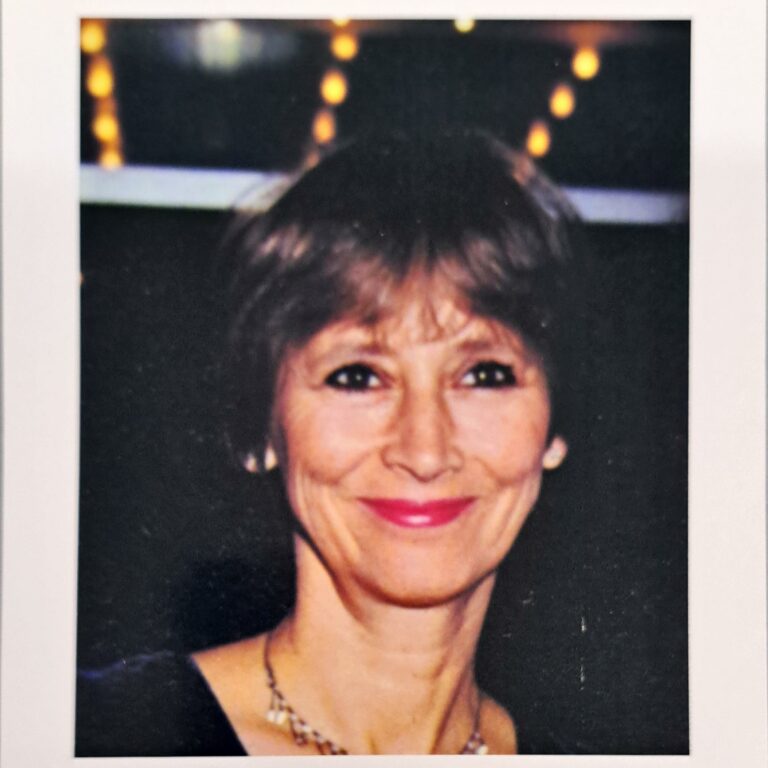 Archive photograph of a smiling Kara Conti, showing her in the 1980s