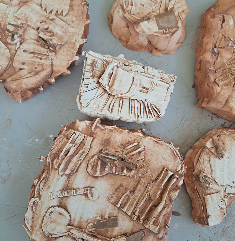 Plaster relief artworks by Year 7 students
