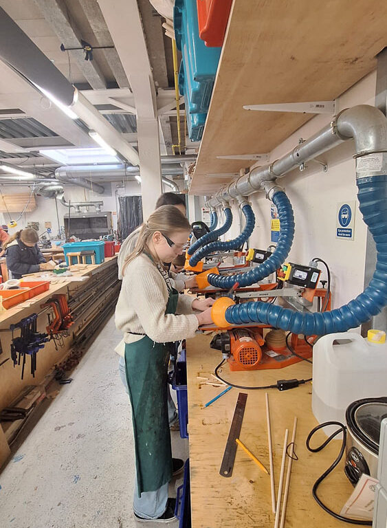 Students using the jigsaws in the Design Technology workshops at The King Alfred School North London