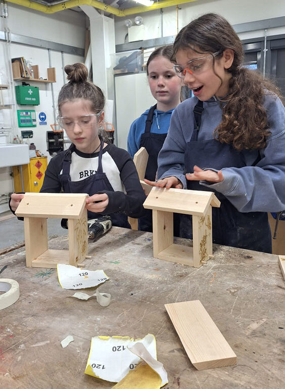Students work on their bird feeders at The King Alfred School North London