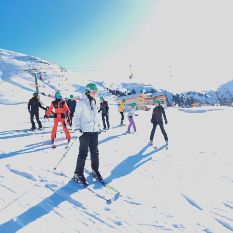Students from The King Alfred School on a bright white ski slope in Italy