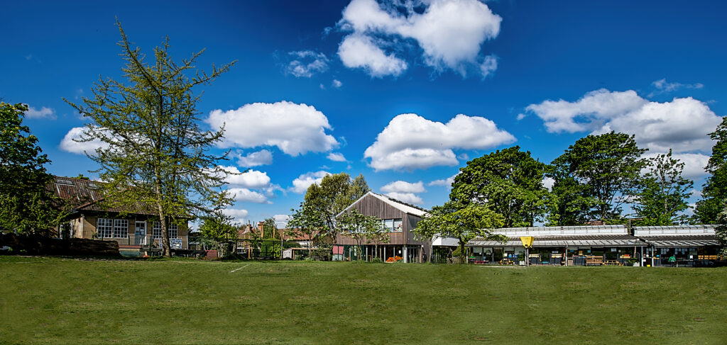 Lower School buildings on a blue sky day