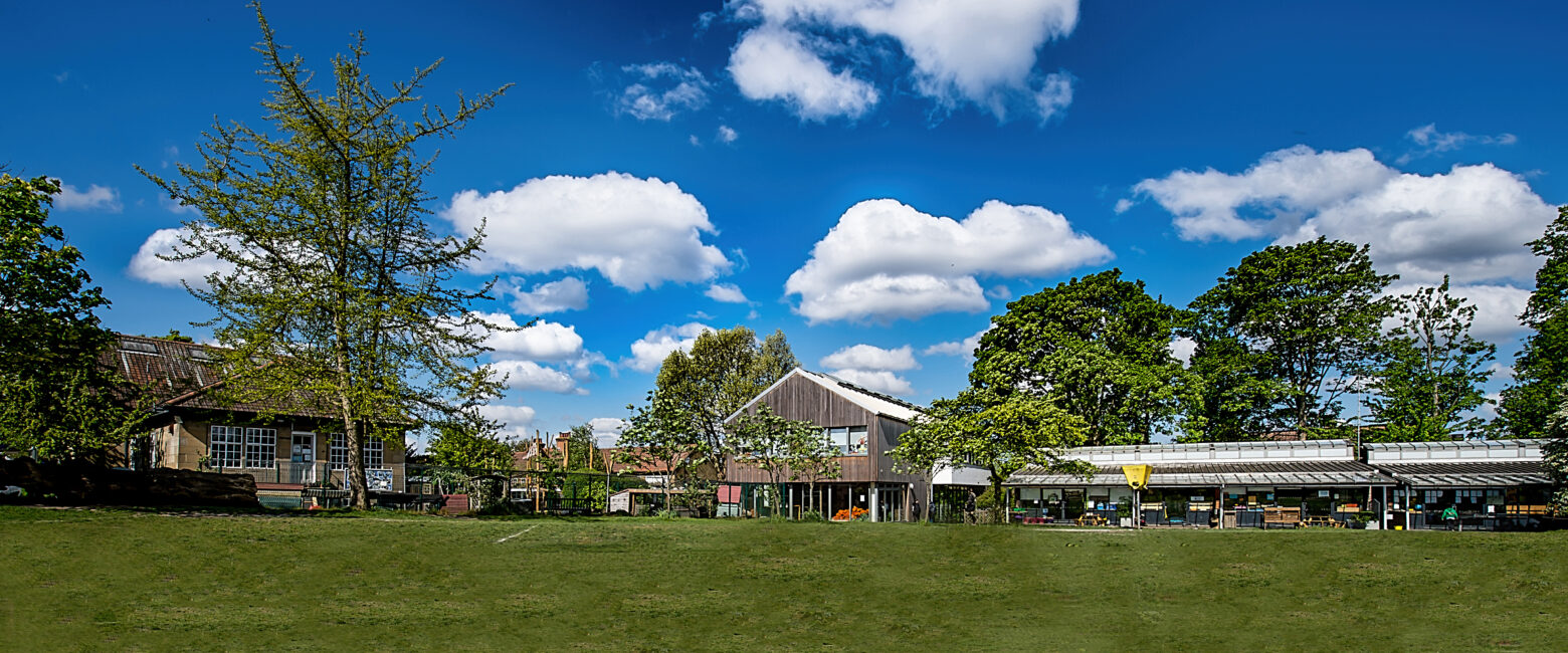 Lower School buildings on a blue sky day