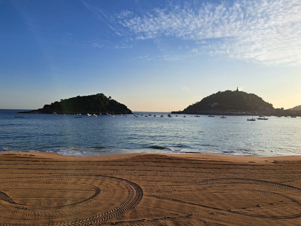 a view out across the sea with two islands in the middle distance