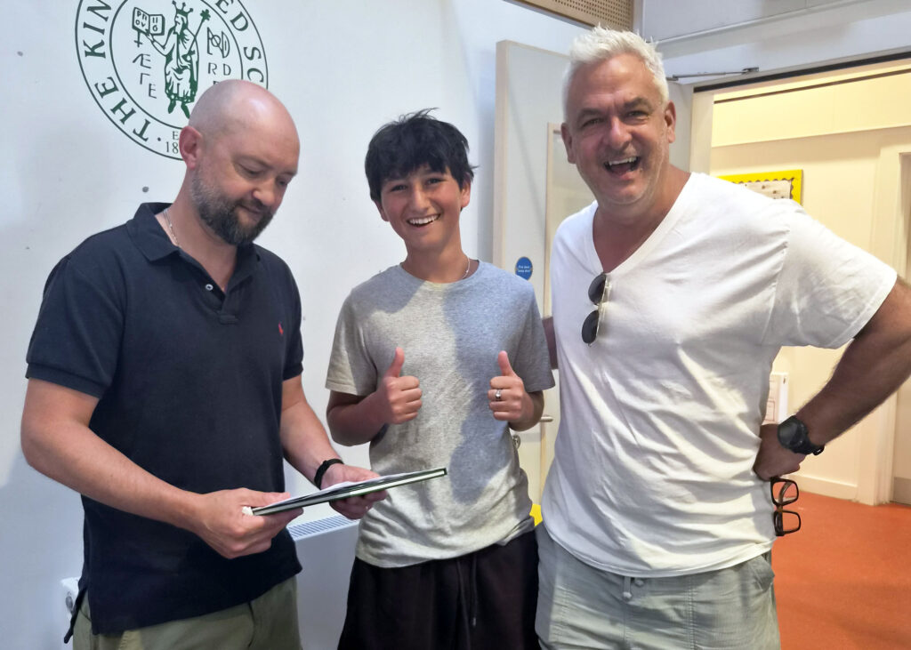 The King Alfred school student Poses With two male teachers